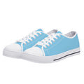 Baby Blue All Over Canvas Lowtops (white pair angled)