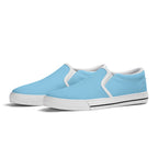 Baby Blue All Over Canvas Slipons (white pair angled)