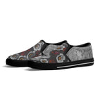 Adorned Canvas Slipons (black pair angled)