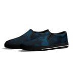 Dot Shift in Cobalt Blue Canvas Slipons (black pair angled)